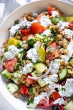 A close up of a plate of food, with Chickpea tomato Salad