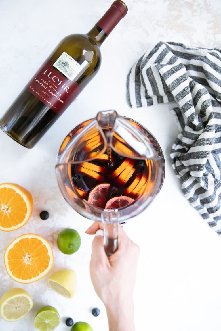 Pitcher filled with Blueberry and orange sangria