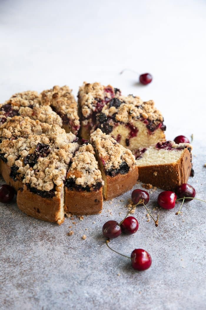 Sliced cherry coffee cake with crumb topping