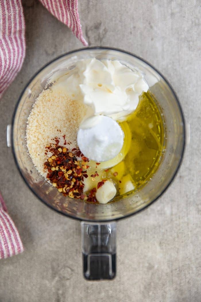 Baked chicken poppers ingredients being mixed in food processor