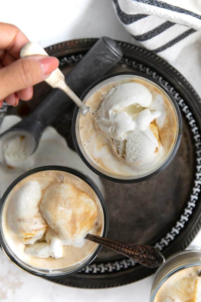 Overhead image of a girl taking a scoop from one of the Affogato glasses