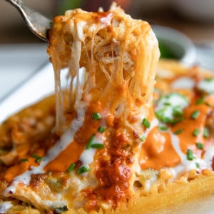 A close up of a Buffalo Chicken Stuffed Spaghetti Squash
