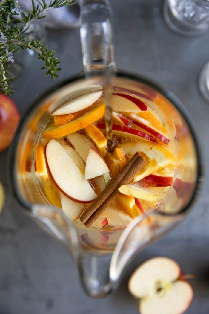 Overhead look into a pitcher filled with fall sangria