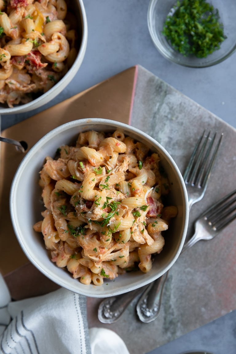 Overhead view of creamy chicken and tomato spiral pasta 