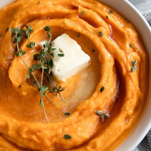 A bowl of mashed sweet potatos