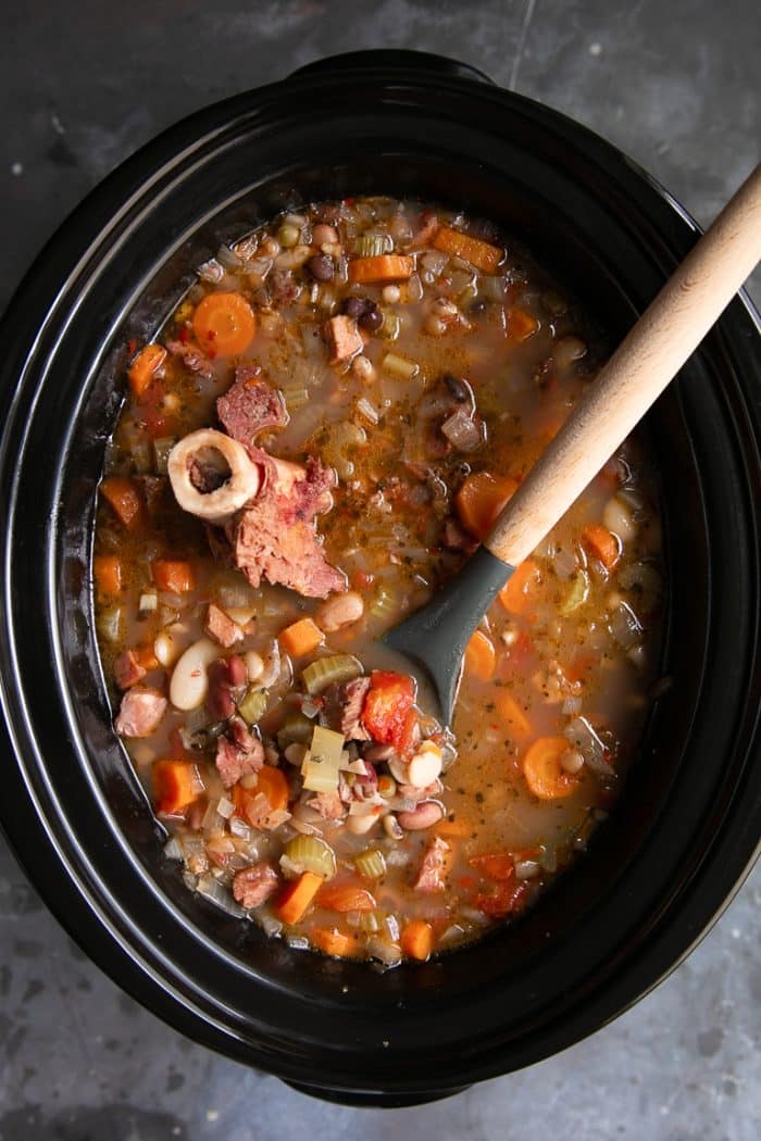 Cooked Ham and Bean Soup in a large Slow Cooker.