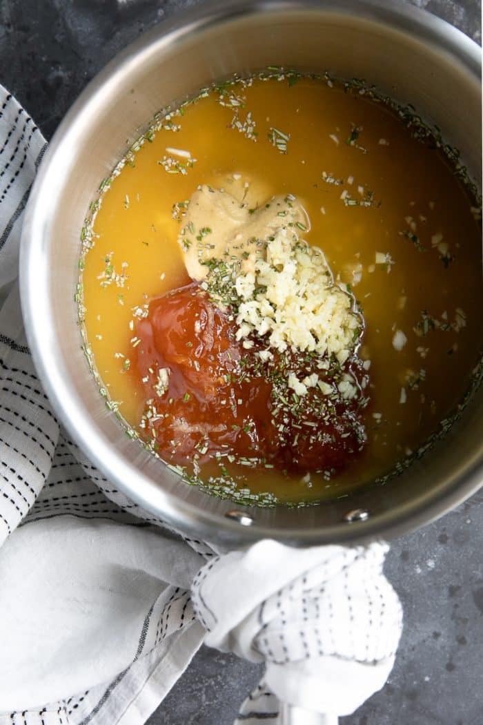 A pot of ham glaze ingredients being mixed