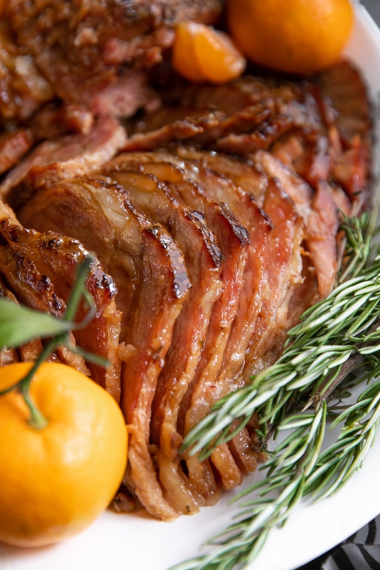 A close up of a sliced slow-cooked ham