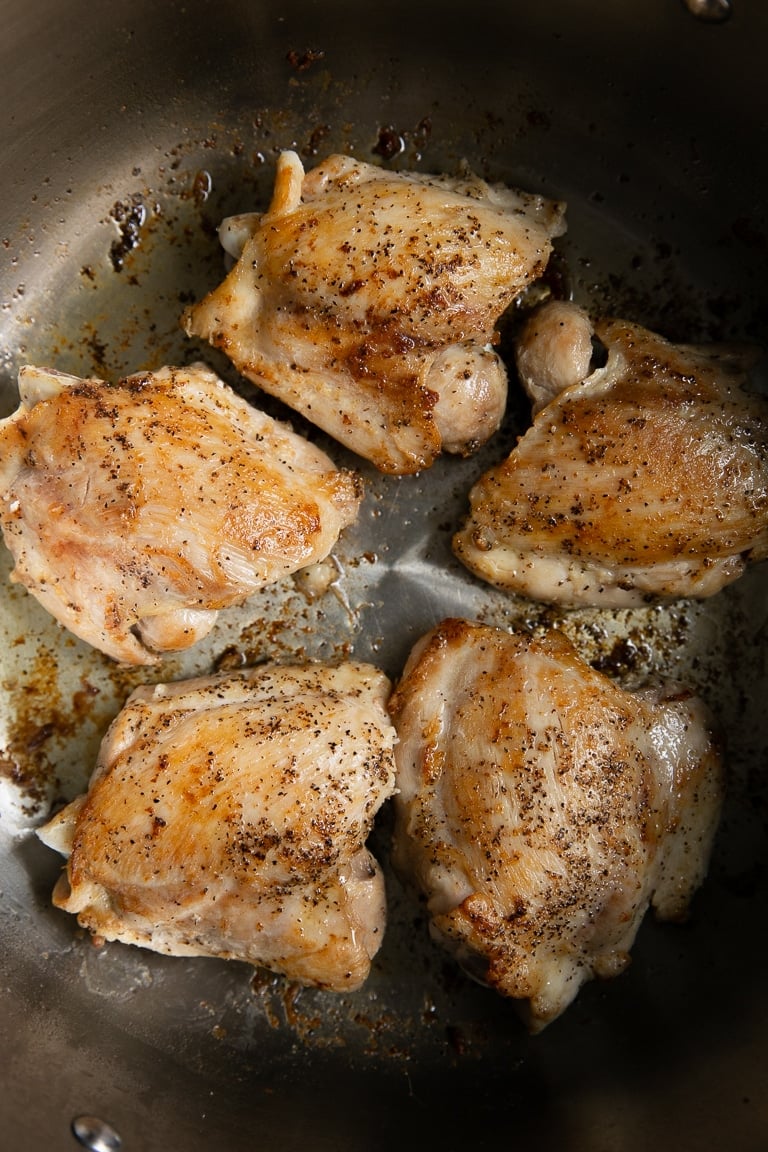 A close up of chicken cooking in a pan, for Chicken Cacciatore
