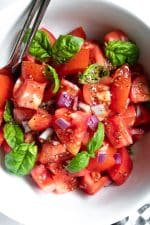 A plate Tomato Basil Salad