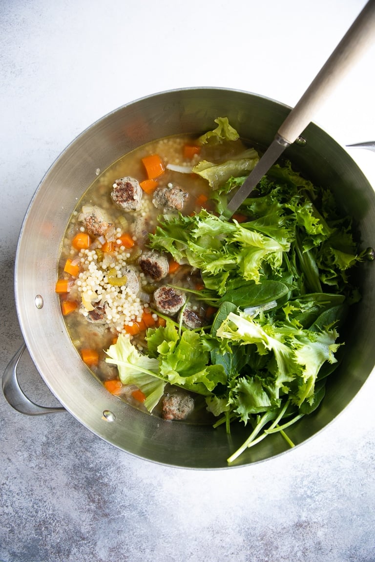 Large pot filled with Italian Wedding Soup.