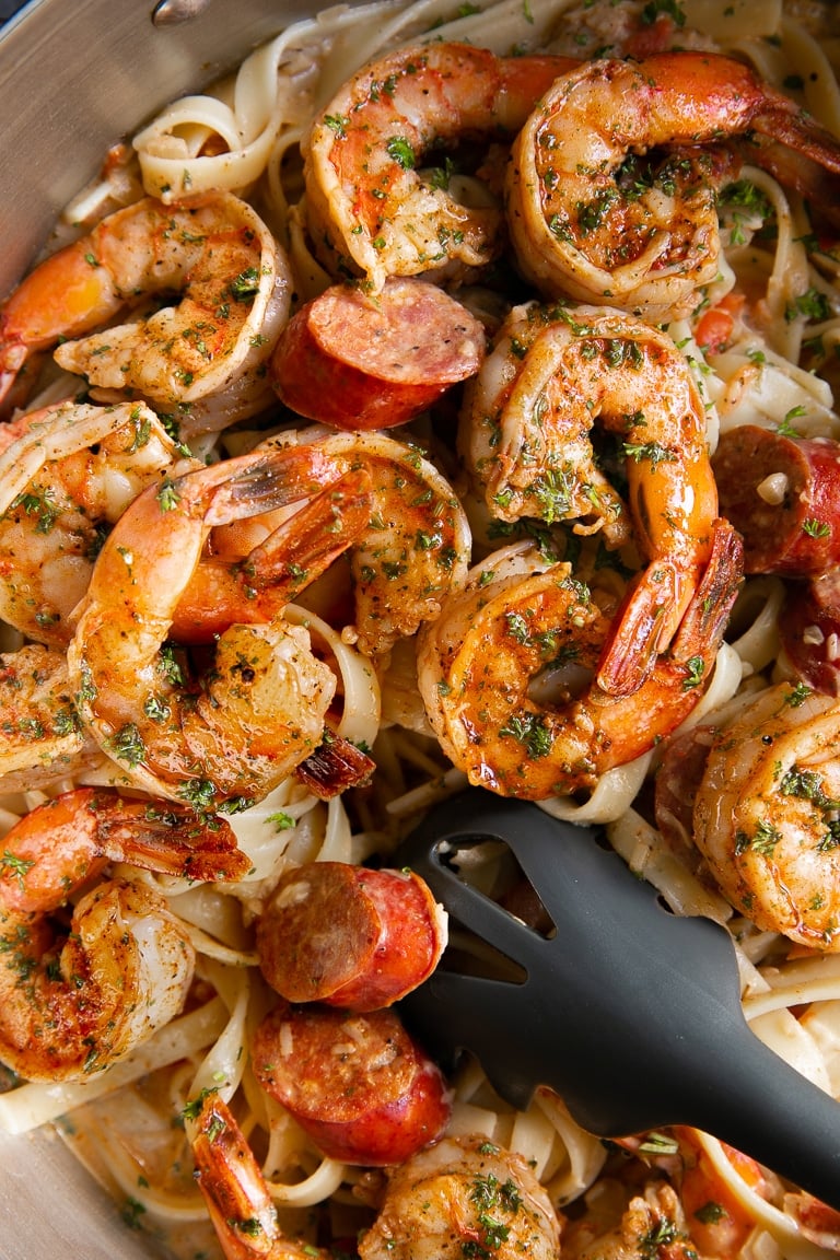 Overhead image of Cajun shrimp with creamy pasta.
