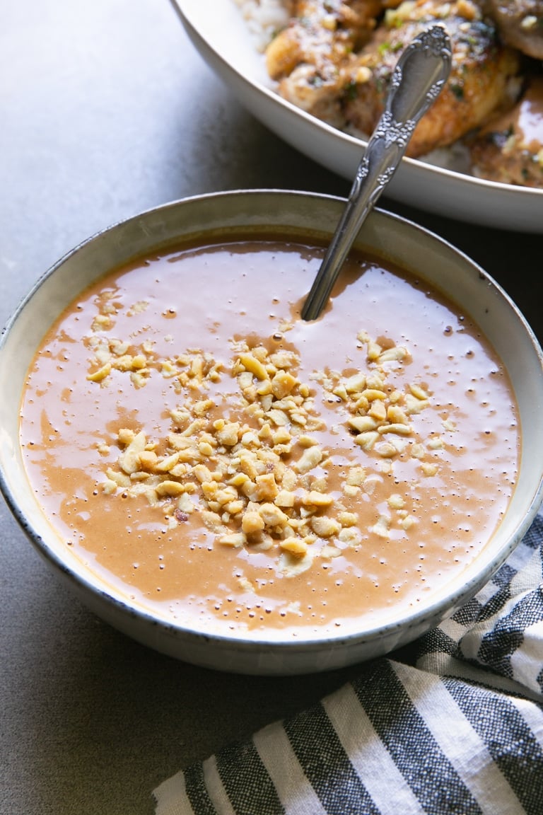 Bowl filled with homemade Thai peanut sauce.