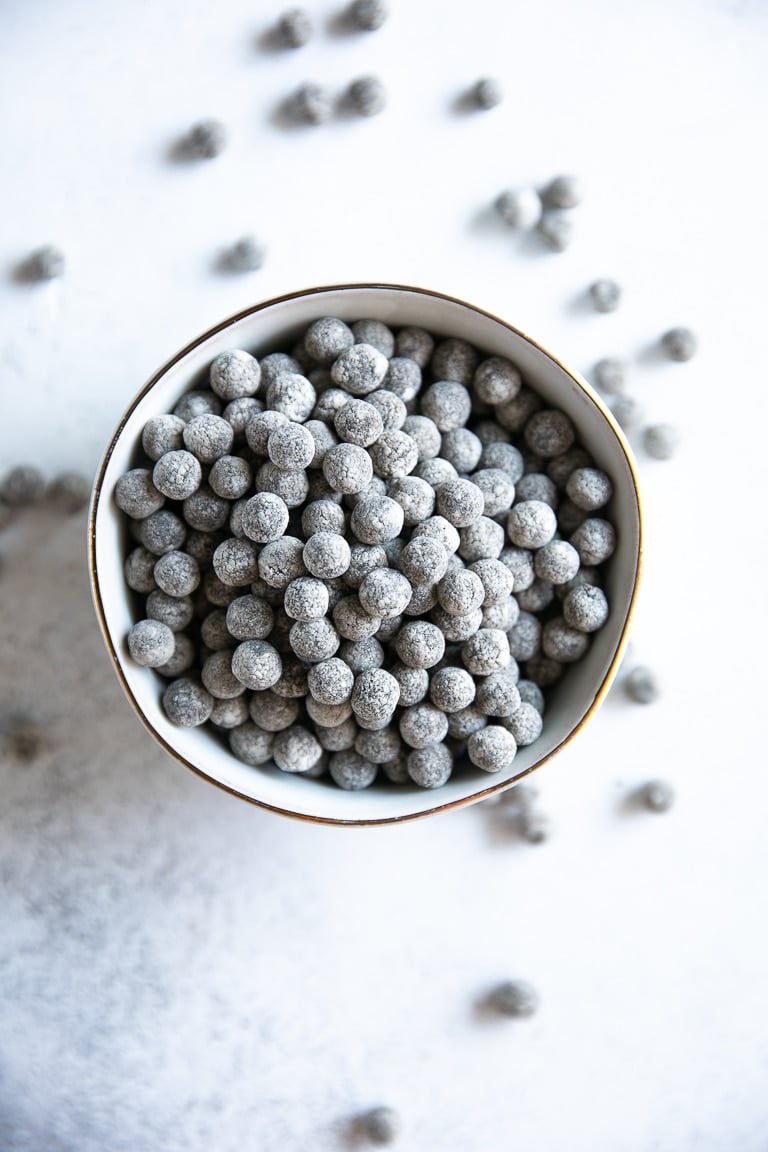 Bowl filled with uncooked quick-cook tapioca pearls for bubble tea.