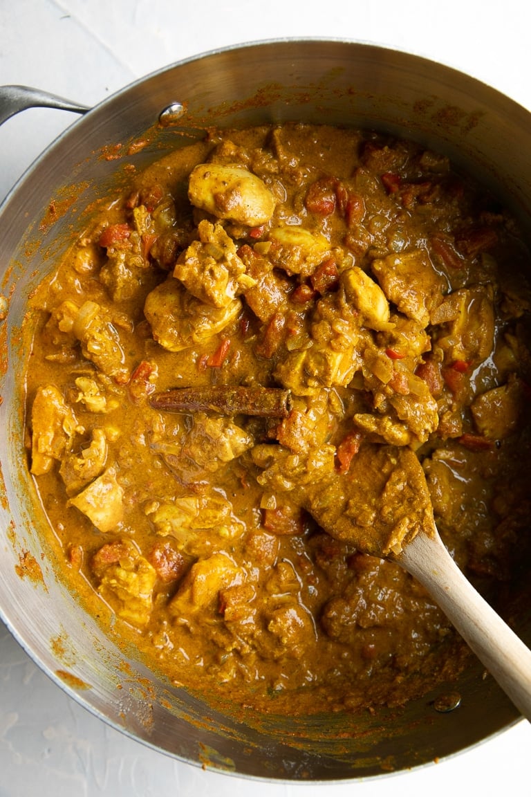 Butter Chicken being cooked in a large pot.