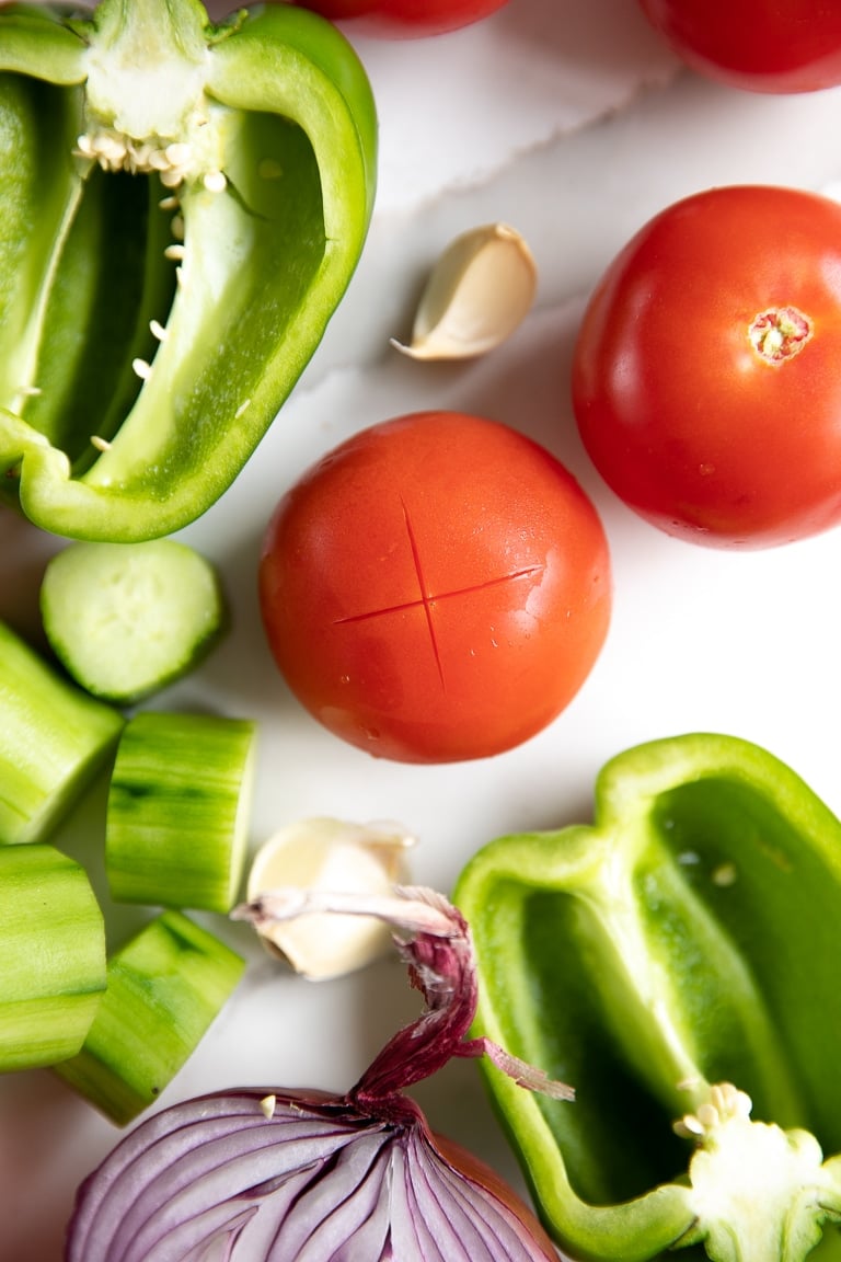 Prepping vegetables to make gazpacho.