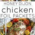 Honey Dijon chicken breast with cherry tomatoes, yellow squash, zucchini, and asparagus cooked in a foil packet, shown with a fork and topped with whole grain mustard and fresh herbs.