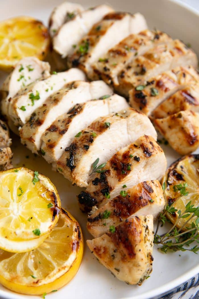 Grilled and sliced Greek marinated chicken breasts.