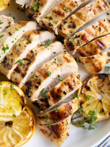 Grilled and sliced Greek marinated chicken breasts.