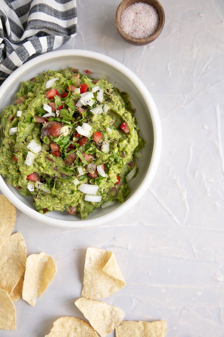 Easy fresh guacamole with tortilla chips.