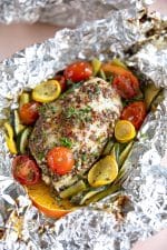 Honey Dijon Chicken Foil Packets with chopped vegetables.