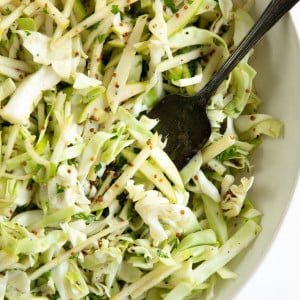 Tossed together crunchy apple coleslaw dressed with a light dijon vinaigrette.
