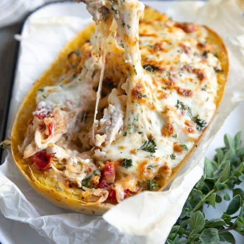 Twice-baked spaghetti squash with chicken cheese pull.