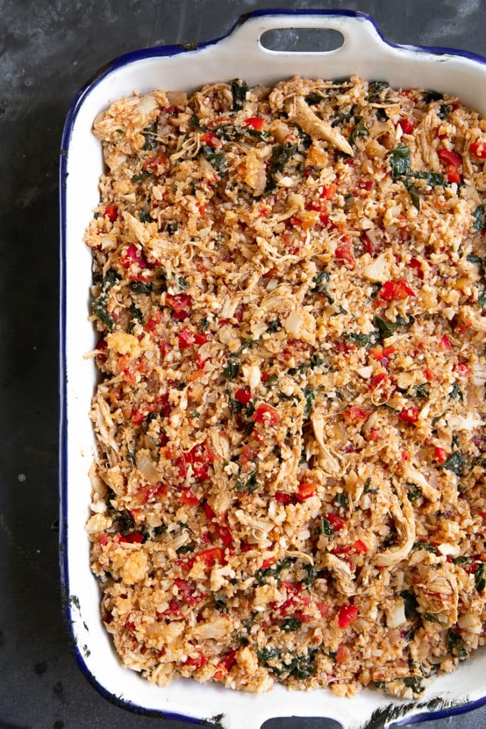 A Casserole dish filled with chicken Caprese casserole