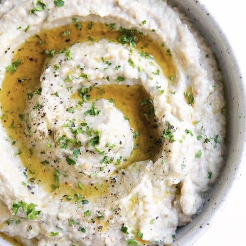 Prepared baba ganoush (eggplant dip) in a shallow serving dish,