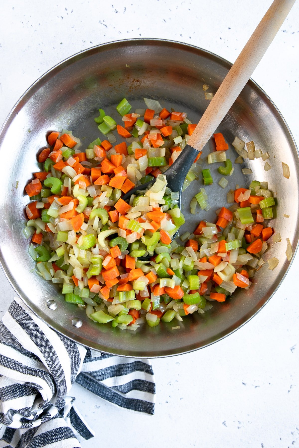 Cooked mirepoix in a large skillet.