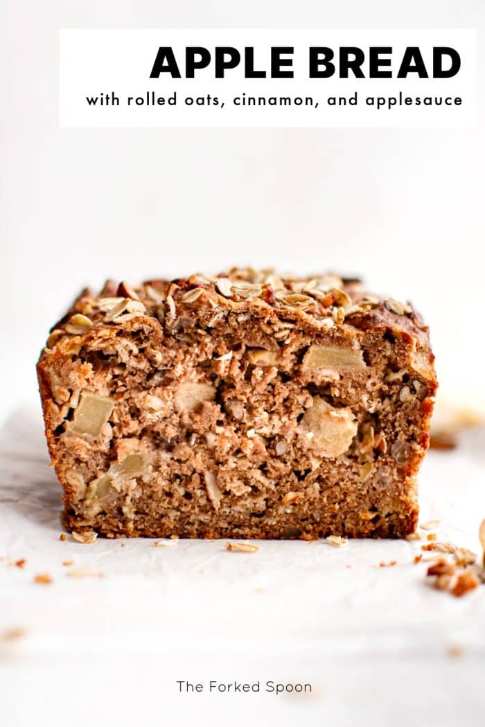 Vertical Pinterest image showing a sliced loaf of apple cinnamon bread with text above reading APPLE BREAD with rolled oats, cinnamon, and applesauce and The Forked Spoon below.