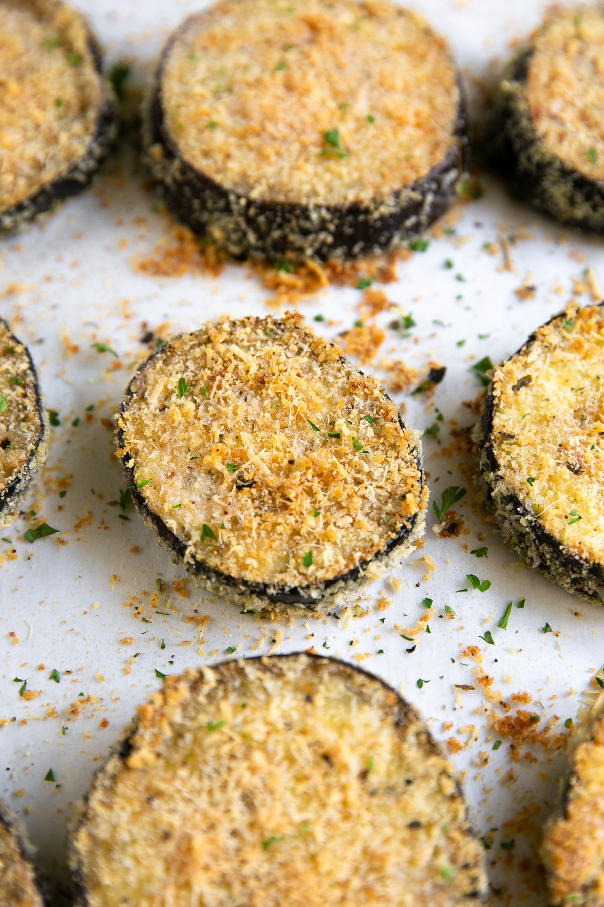 Crispy baked eggplant slices breaded with panko and parmesan cheese.