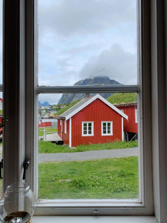 Cute red fishing hut in Lofoten, Norway.