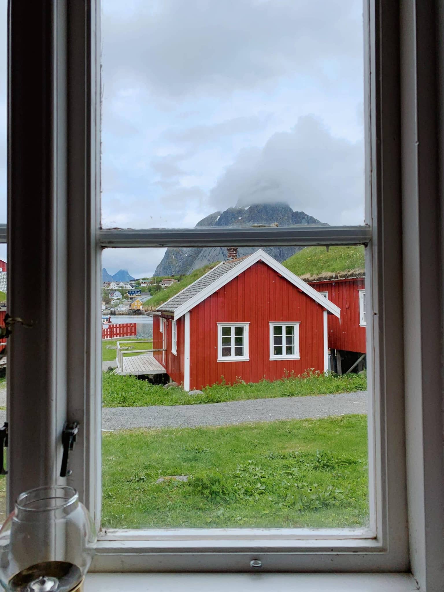 Cute red fishing hut in Lofoten, Norway.