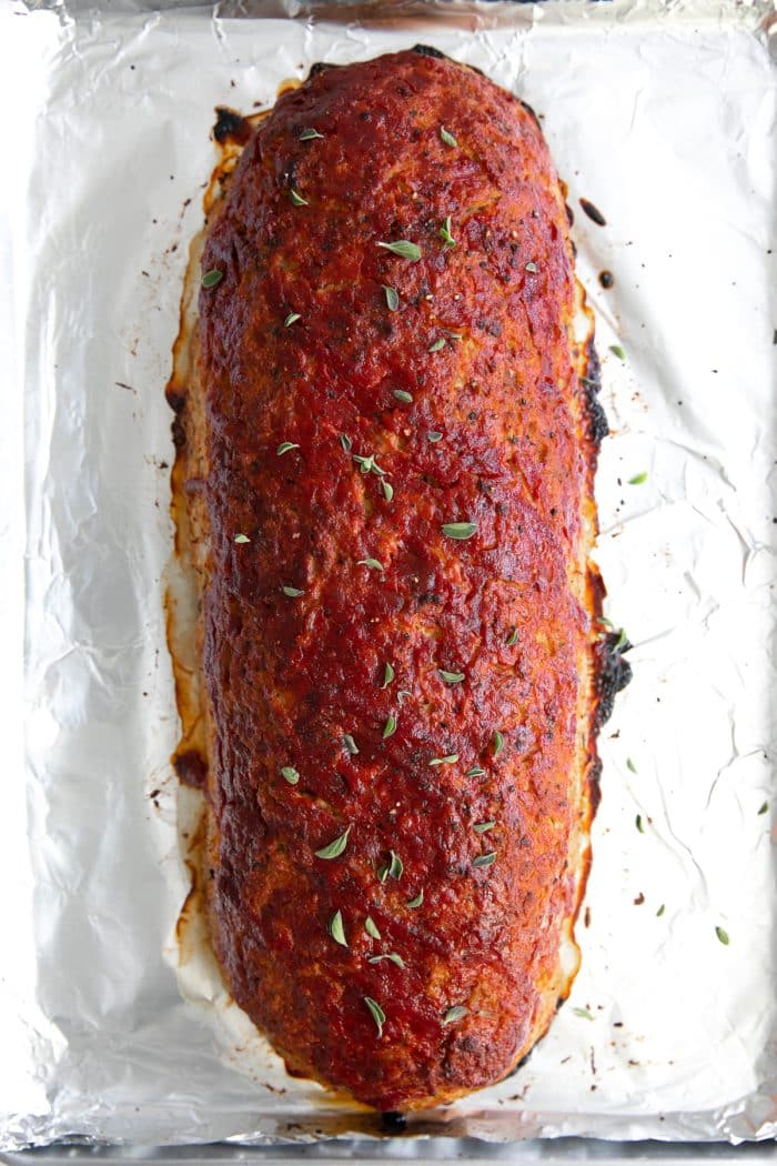 Baked turkey meatloaf on a baking sheet.