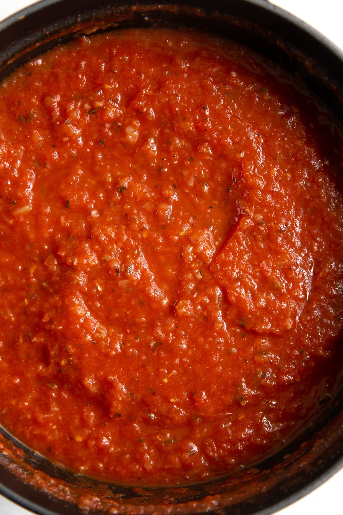 Saucepot filled with homemade tomato sauce.