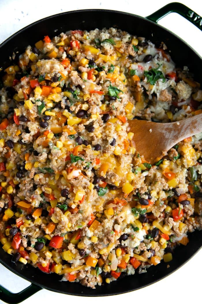 Mexican quinoa skillet before being topped with cheese and baked.