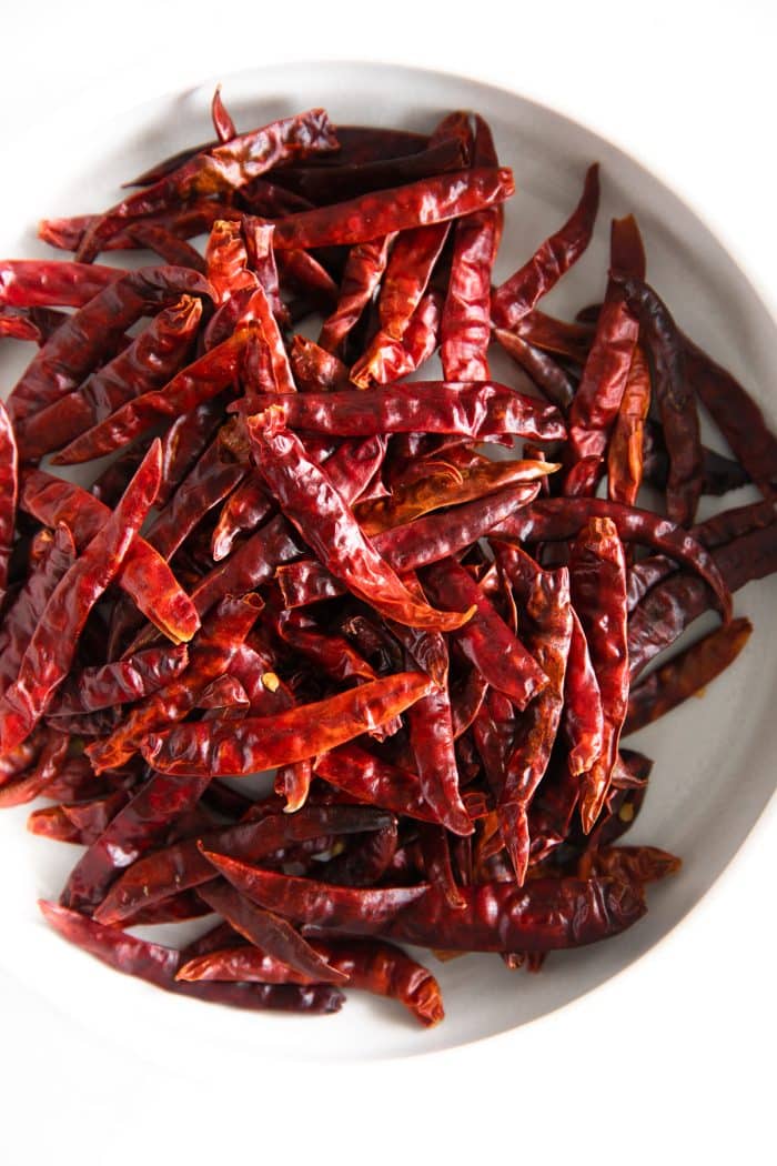 Whole dried Thai red chilis.