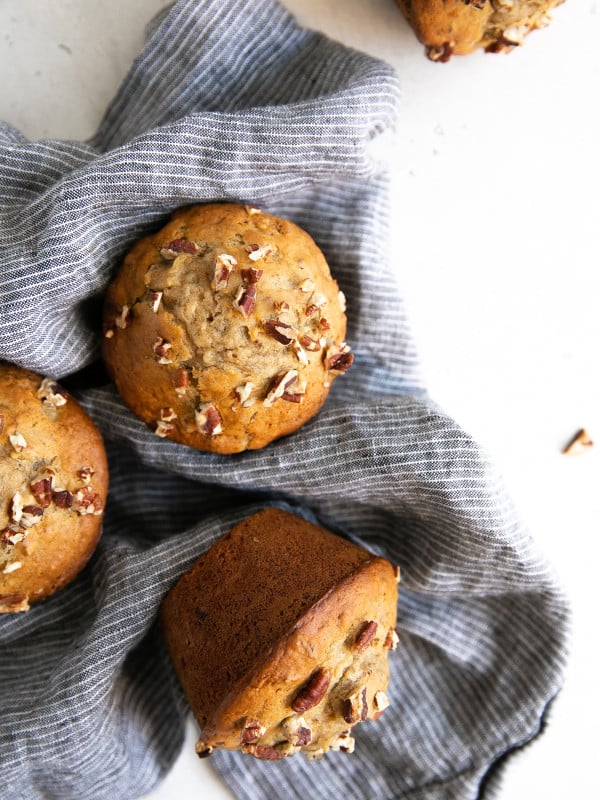 Freshly baked banana muffins with nuts.
