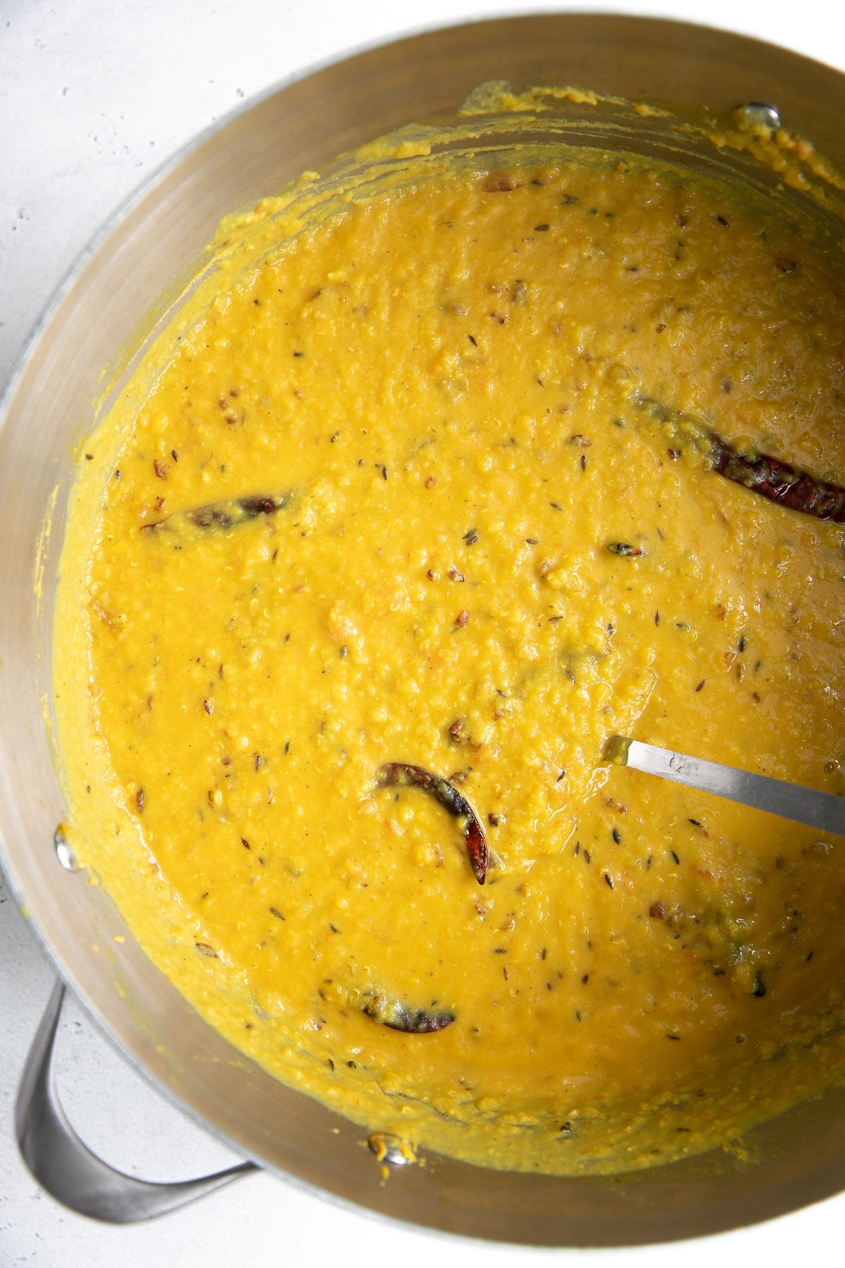 Large pot filled with cooked Indian Masoor Dal.