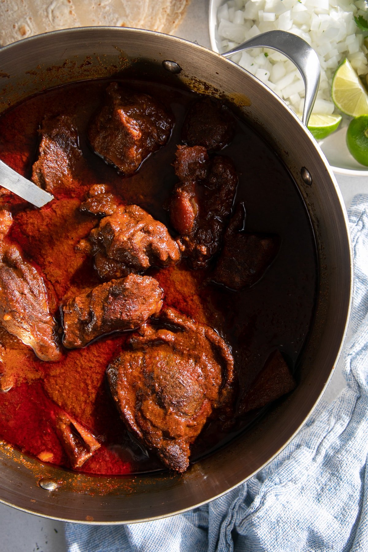 Large pot filled with Mexican birria made with beef and lamb.