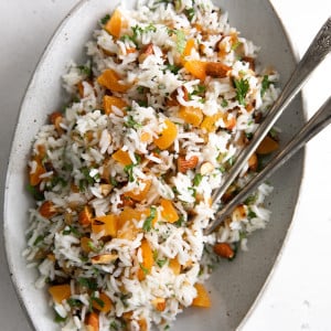 Oval-shaped serving dish filled with basmati rice recipe.