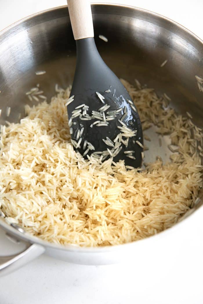 Perfectly golden and toasted grains of white basmati rice.