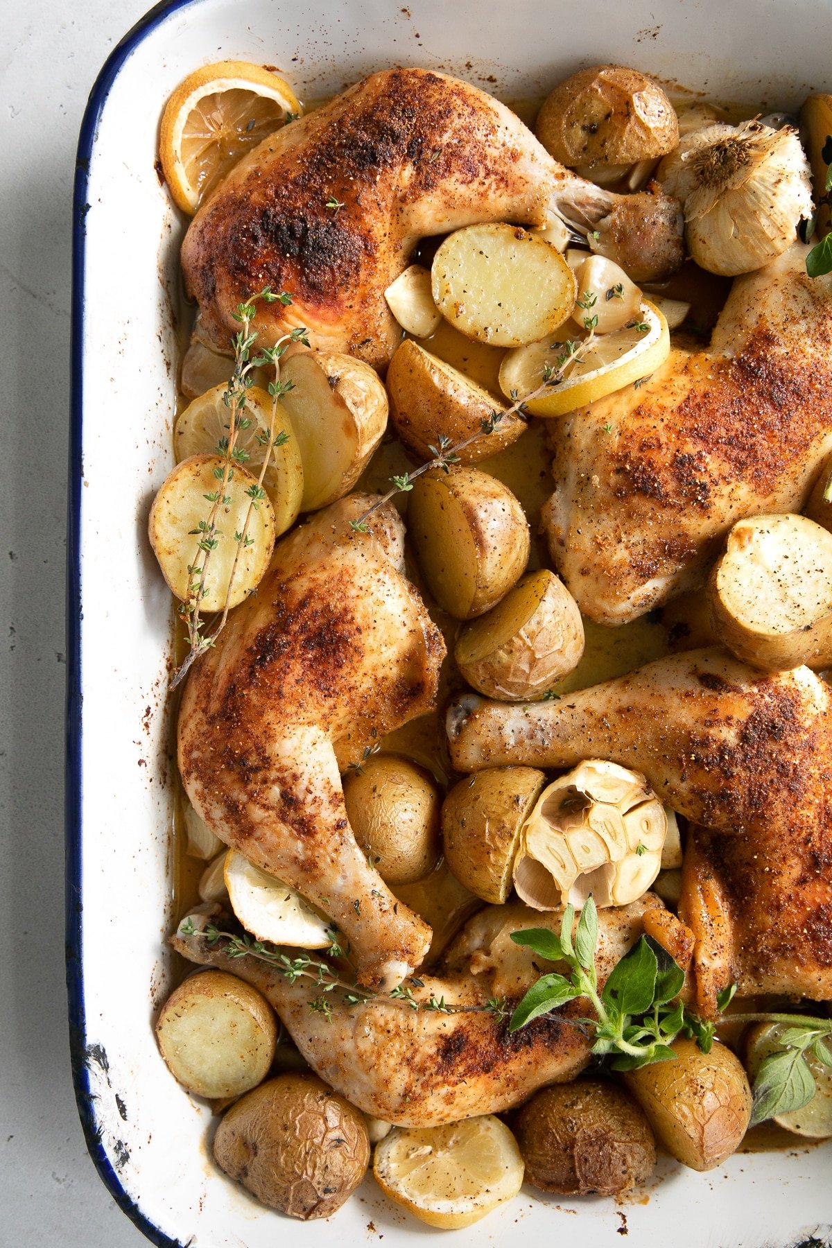 Oven Roasted Chicken Legs Potatoes - The Forked Spoon