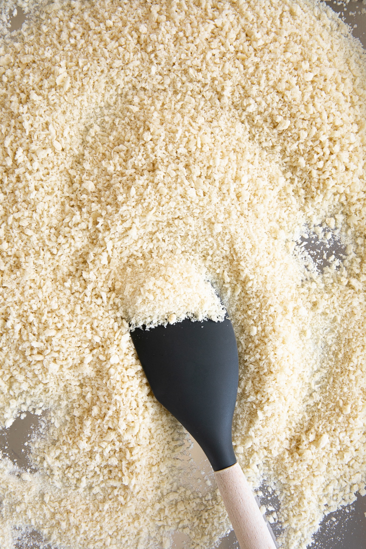 Panko breadcrumbs on a baking sheet before toasting.