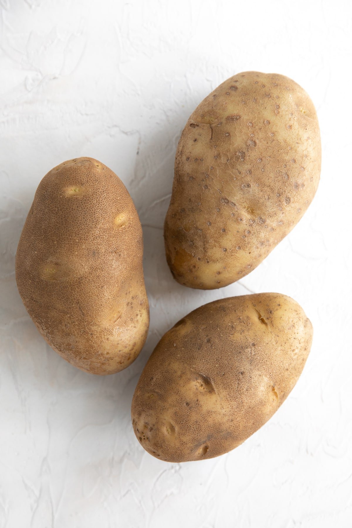 Three large russet potatoes