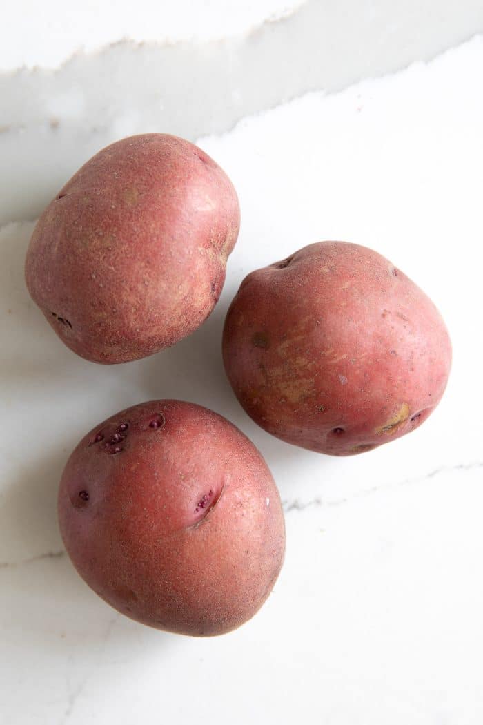 Three red potatoes.