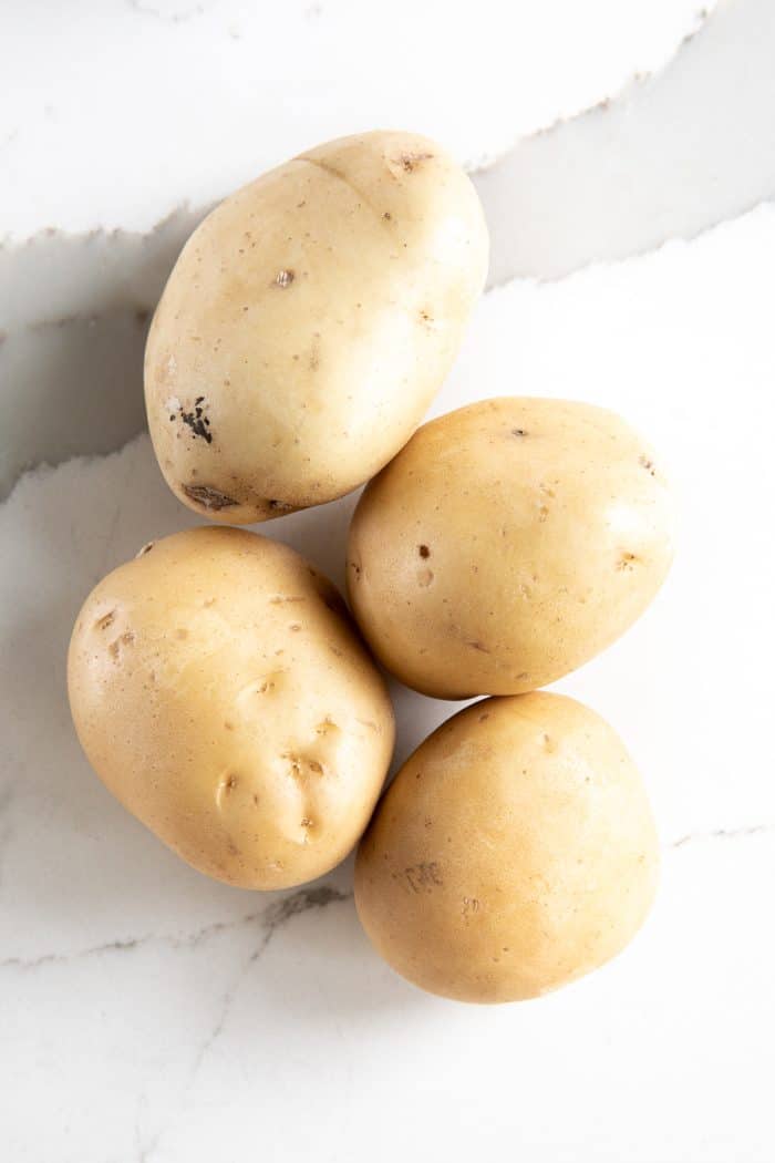 Four Yukon gold potatoes.