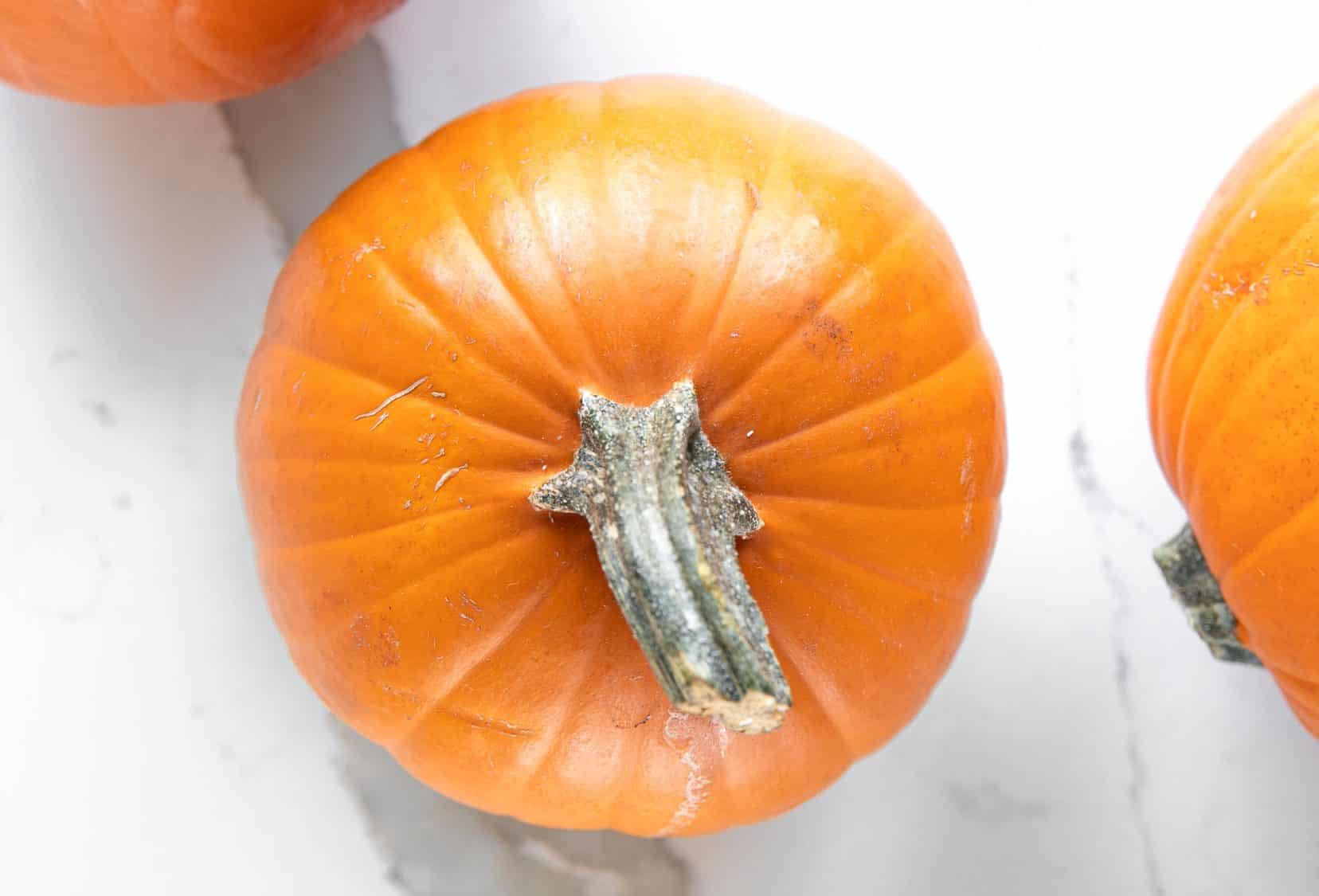 Image of 3 small sugar pumpkins.