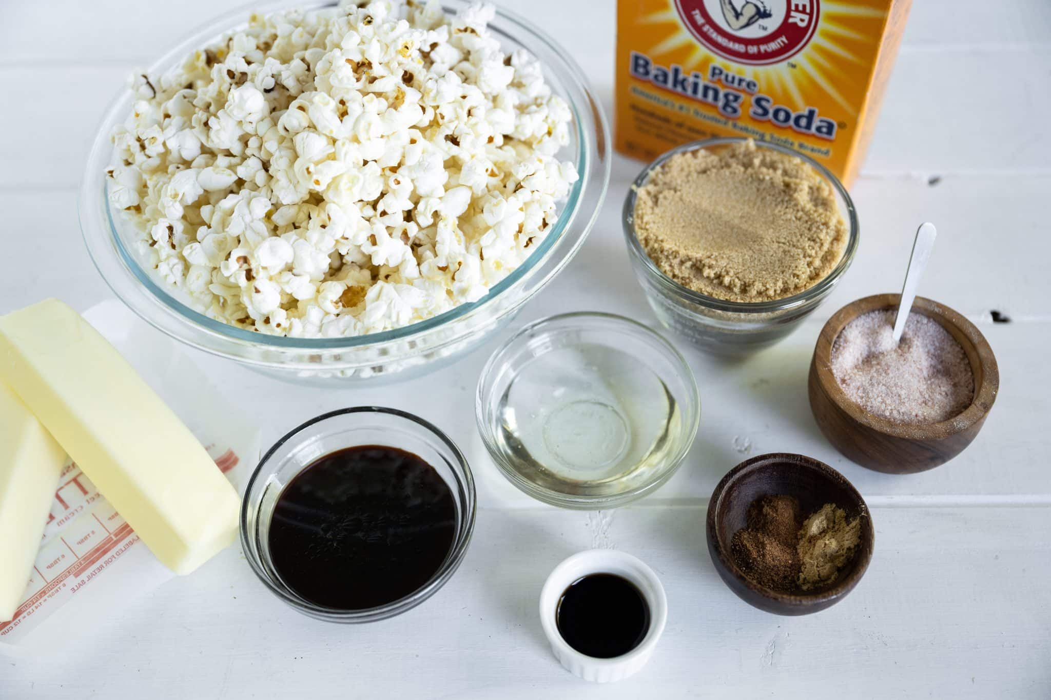 Ingredients needed to make homemade gingerbread caramel corn.